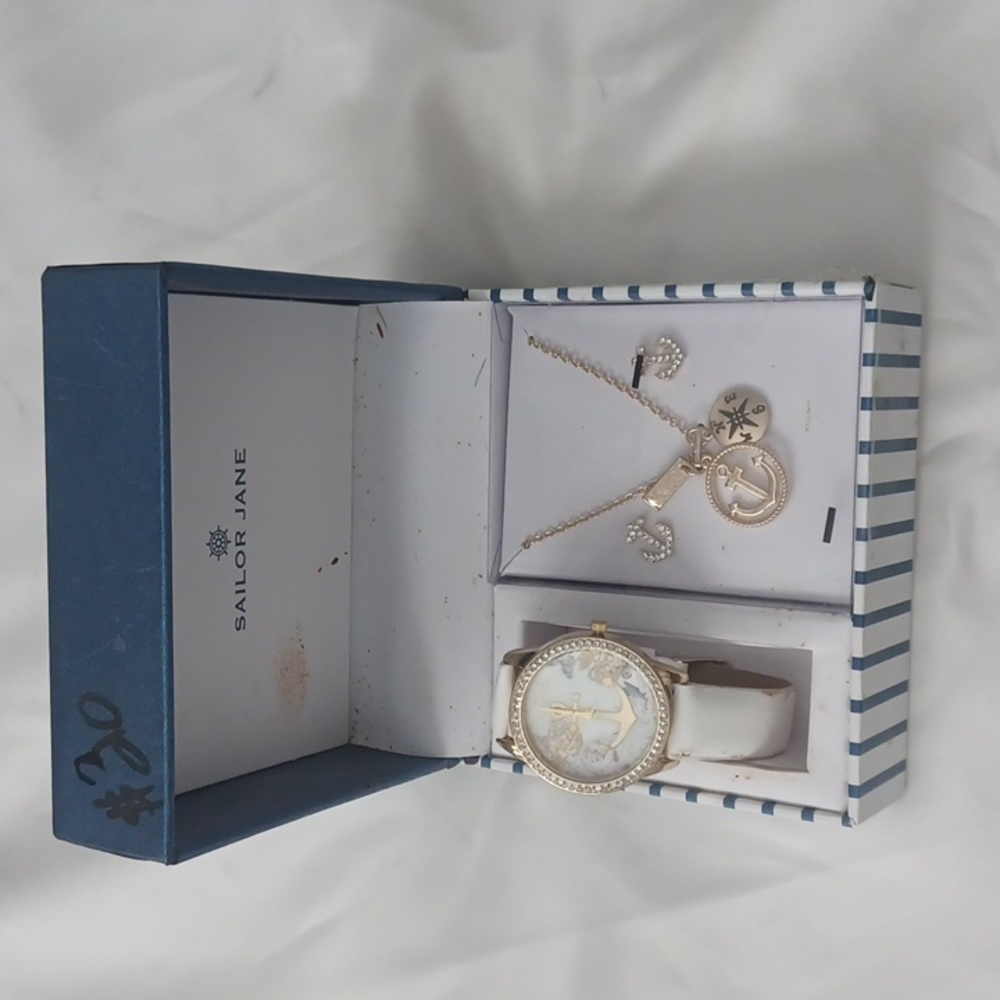 Brand new, never worn sailor watch earring necklace with Arnaments attached